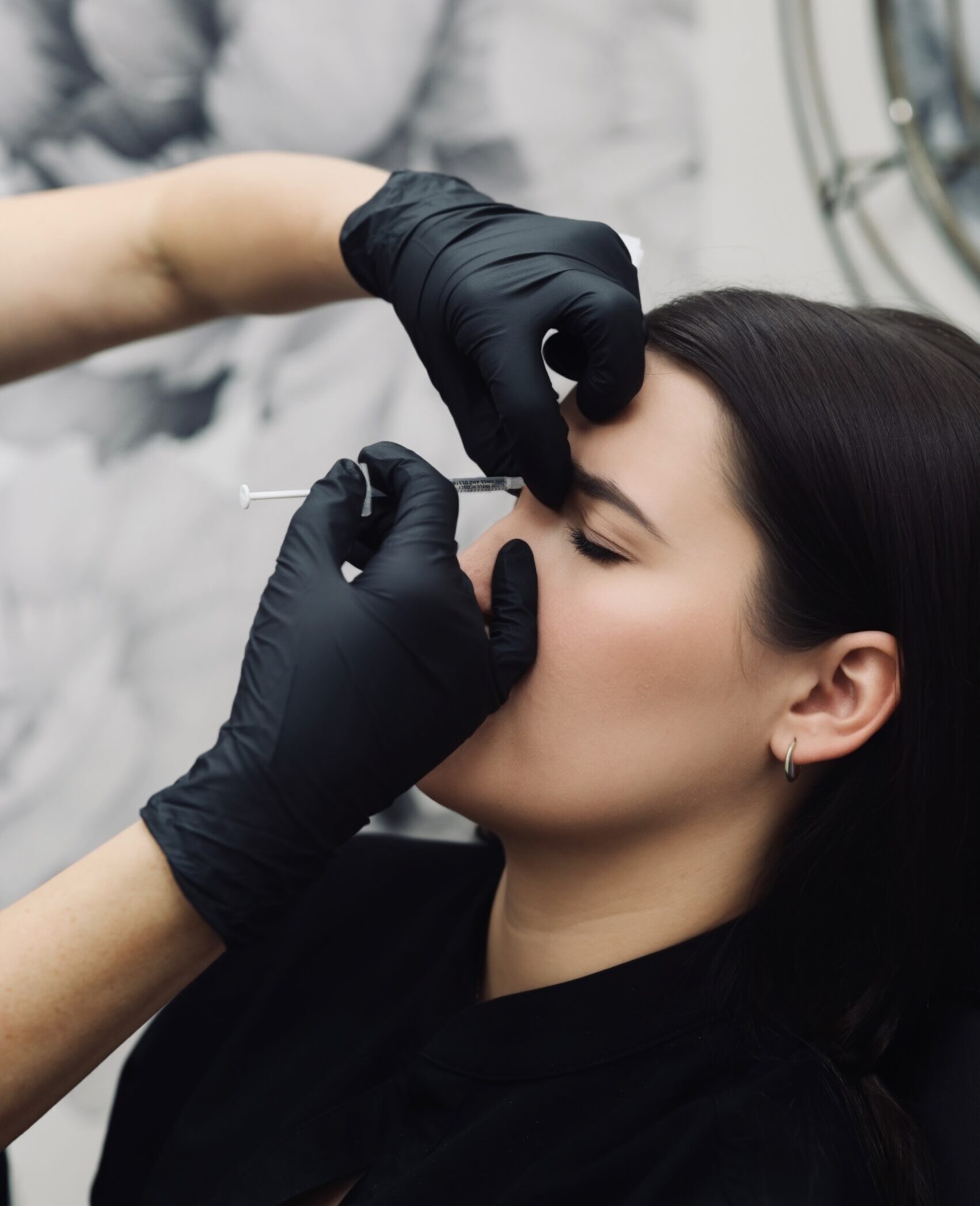 Neuromodulator treatment being performed at Seamless Health and Medical Aesthetics
