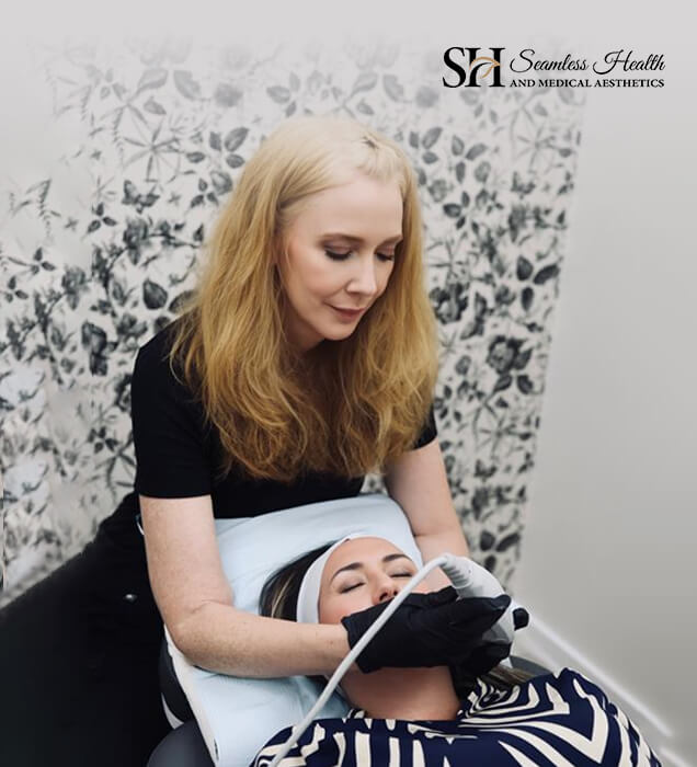 Seamless Health instructor marking a patient's face during training